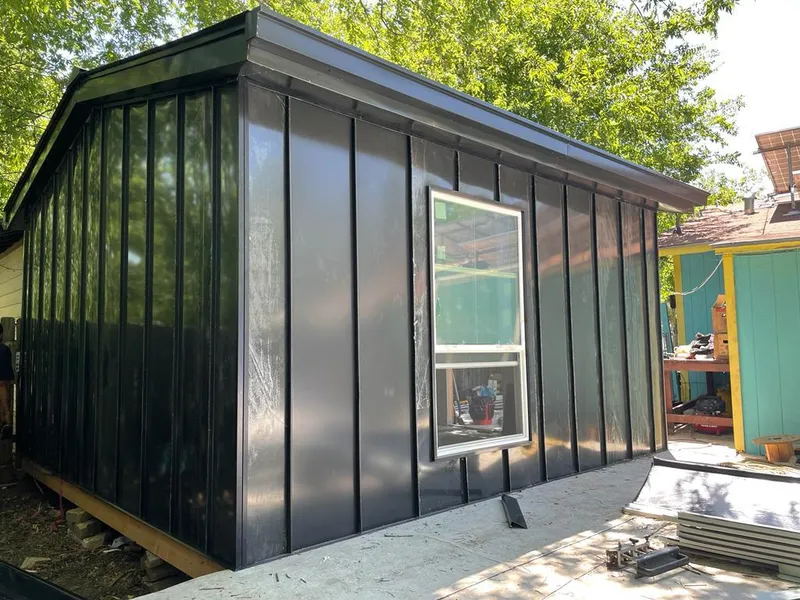 Black standing seam metal wall panels for Roof Inspection in West Caln