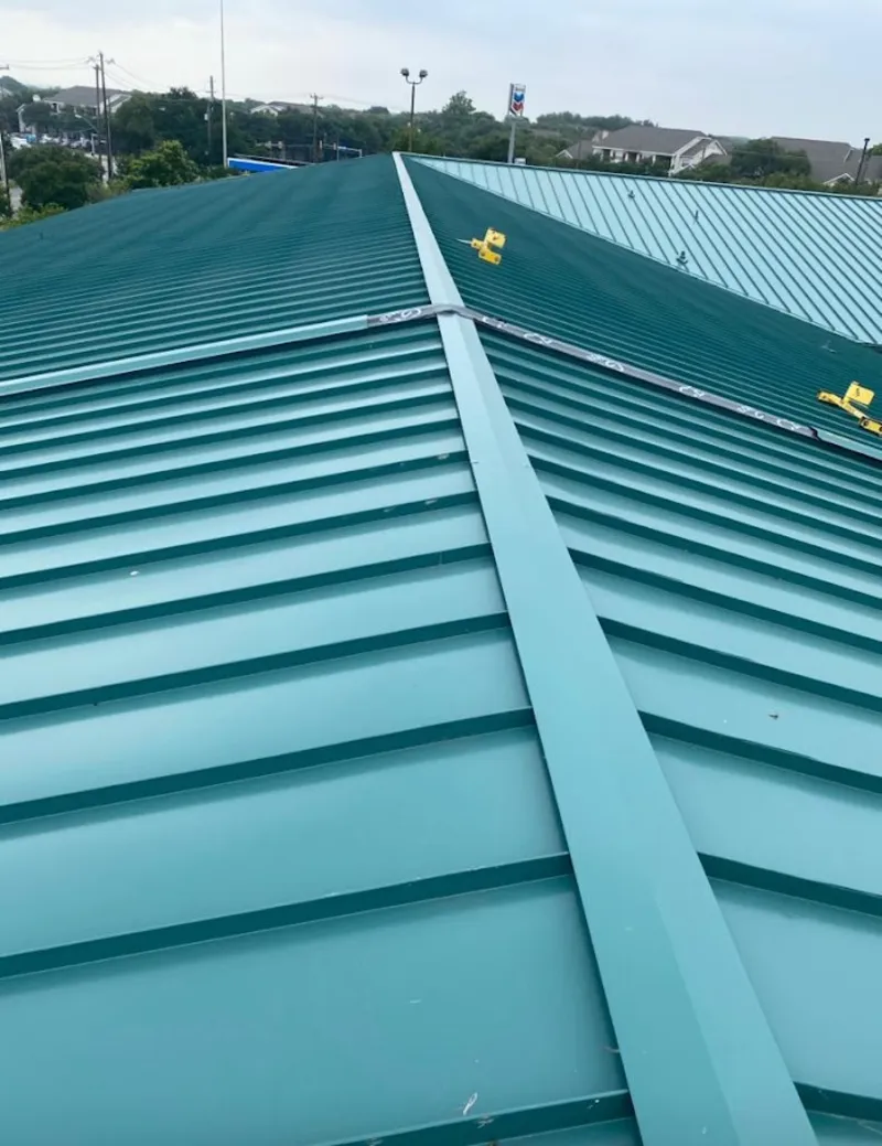 Green commercial metal roof ridge and valley for Metal Roof Repair in West Caln